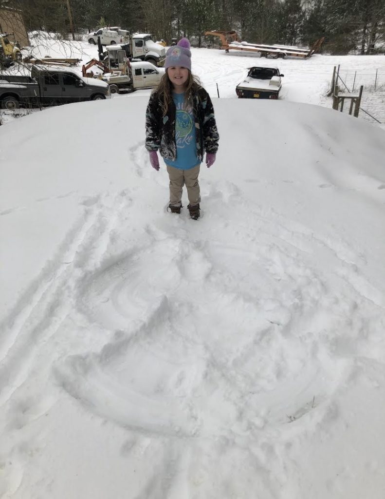 Student with Snow Angel
