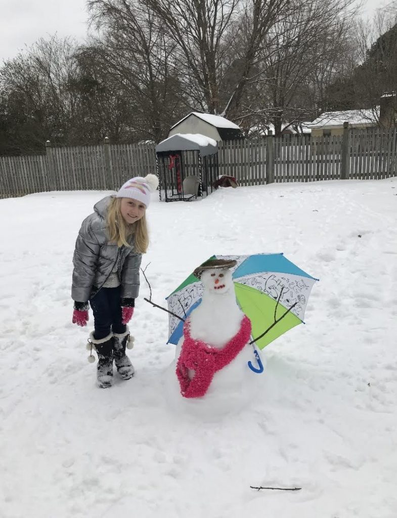 Student with snowman