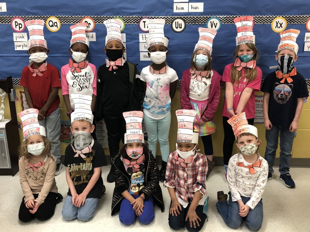 Mrs. Duncan's kindergarten class shows off their Cat in the Hat hats and bowties