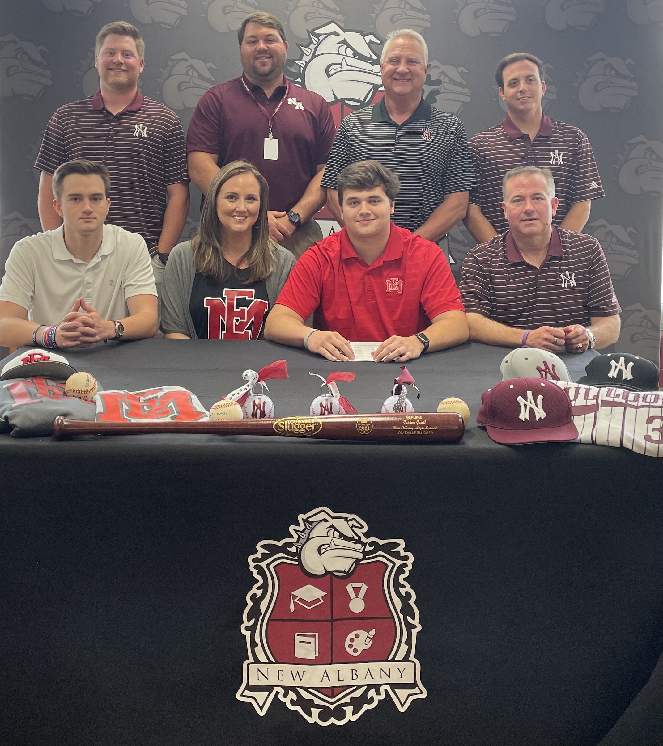 Carson Gault is surrounded by family and coaches as he signs to play baseball for East Mississippi Community College.