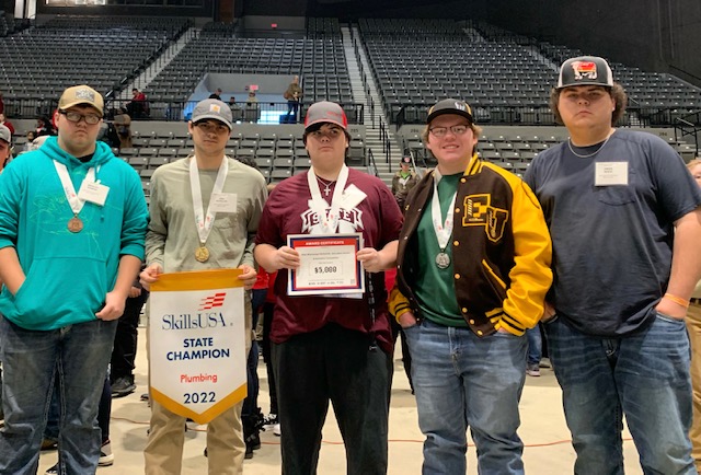 The following New Albany School of Career & Technical Education students participated and placed in the SkillsUSA State Competition held in Jackson on March 9-10: Pictured (l-r) Bradley Robbins, 3rd place/Bronze, Electrical Wiring; Joel McMillen, 1st place/Gold, Plumbing; Will Coleman, 2nd place/Silver, Auto Service Tech; Levi Pannell, 2nd place/Silver, Architectural Drafting; and Owen White. Jonathan Garrison, Rick Robbins, and Kevin Wigington serve as the SkillsUSA advisors.