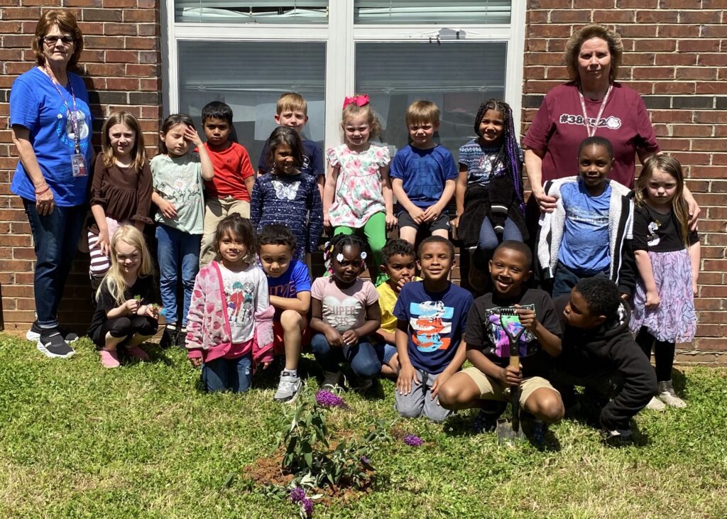 Kindergarten students in Mrs. Balinda Denton and Mrs. Carolyn Hall's class at NAES have been busy lately. They have been learning the life cycle of a butterfly and growing butterflies. In observance of Earth Day, they planted a butterfly bush outside their window to hopefully attract more butterflies!