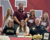 New Albany High School senior cheerleader Bailey Robertson was surrounded by friends and family as she signed with Northeast Mississippi Community College on Wednesday, May 11. Pictured are front row l-r: Neely Robertson, Bailey Robertson, Chris Robertson; back row l-r: Logan Lee Robertson, NAHS Athletic Director Cody Stubblefield, NAHS Cheer Coach Melanie Anderson, NAHS Cheer Coach Mary Scott Sanks.