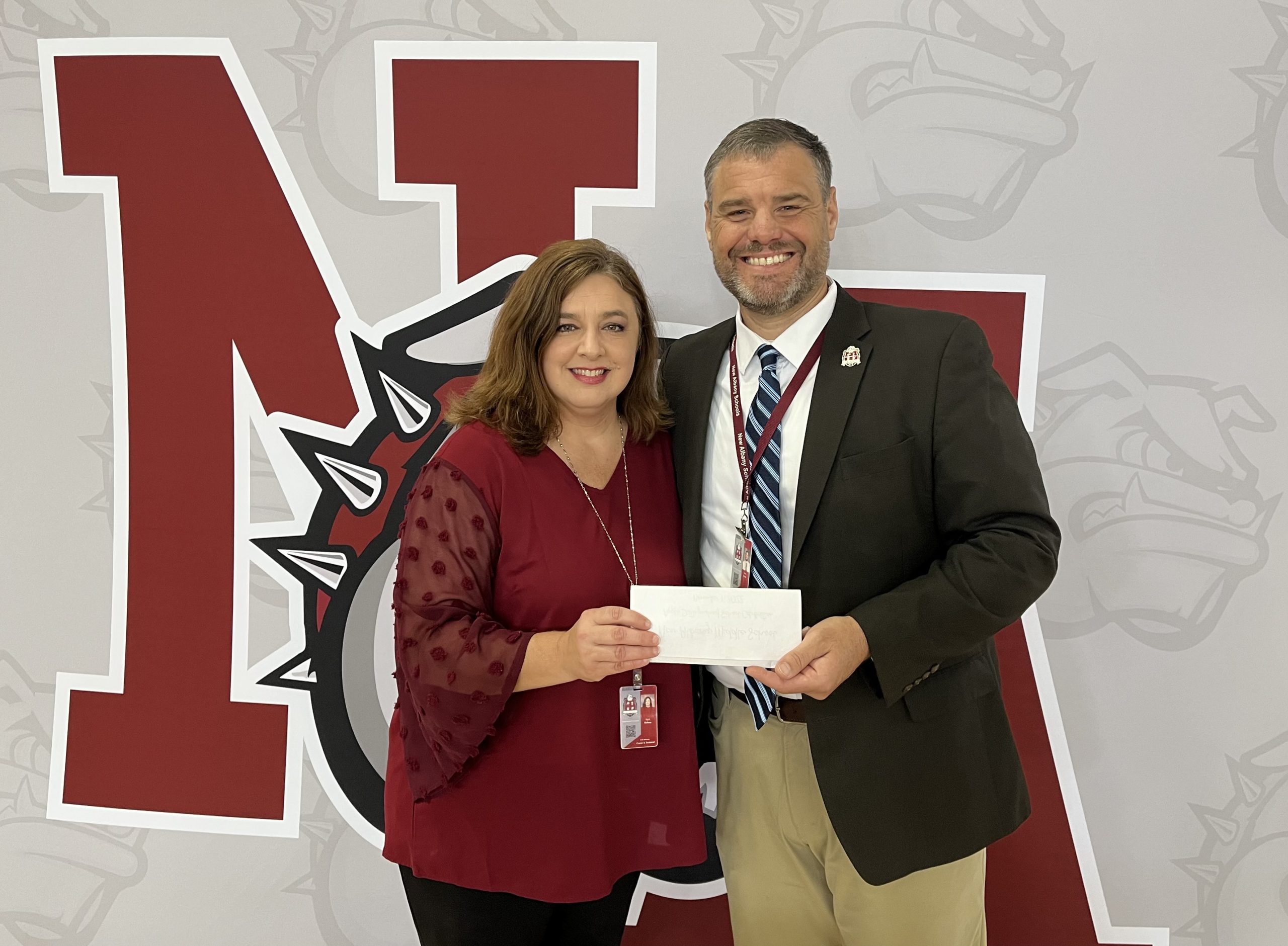 New Albany School of Career & Technical Education has been selected to receive a $2,250 Walmart Community grant. This money will assist in the implementation of a greenhouse program for the Agriscience classes. PIctured are l-r: April Hobson, Career & Technical Director and Dr. Lance Evans, Superintendent.
