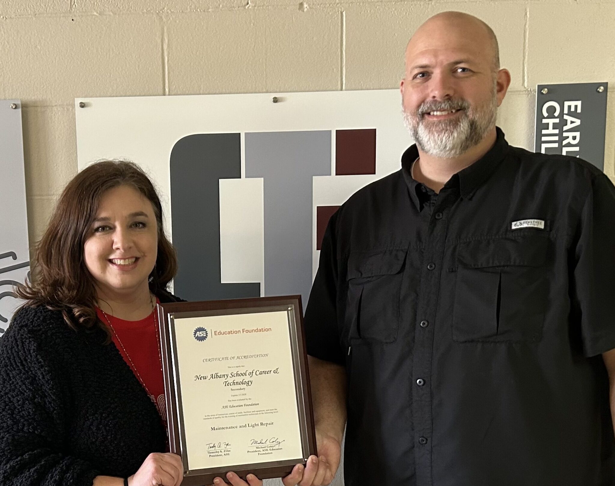 The New Albany School of Career & Technical Education has recently met the criteria for the renewal of program accreditation in Maintenance and Light Repair by the ASE (Automotive Service Excellence) and received the Certificate of Accreditation. This ensures that the Auto Mechanics CTE program is maintaining standards and industry requirements. Pictured are April Hobson, CTE Director and Jonathan Garrison, Auto Mechanics Instructor.