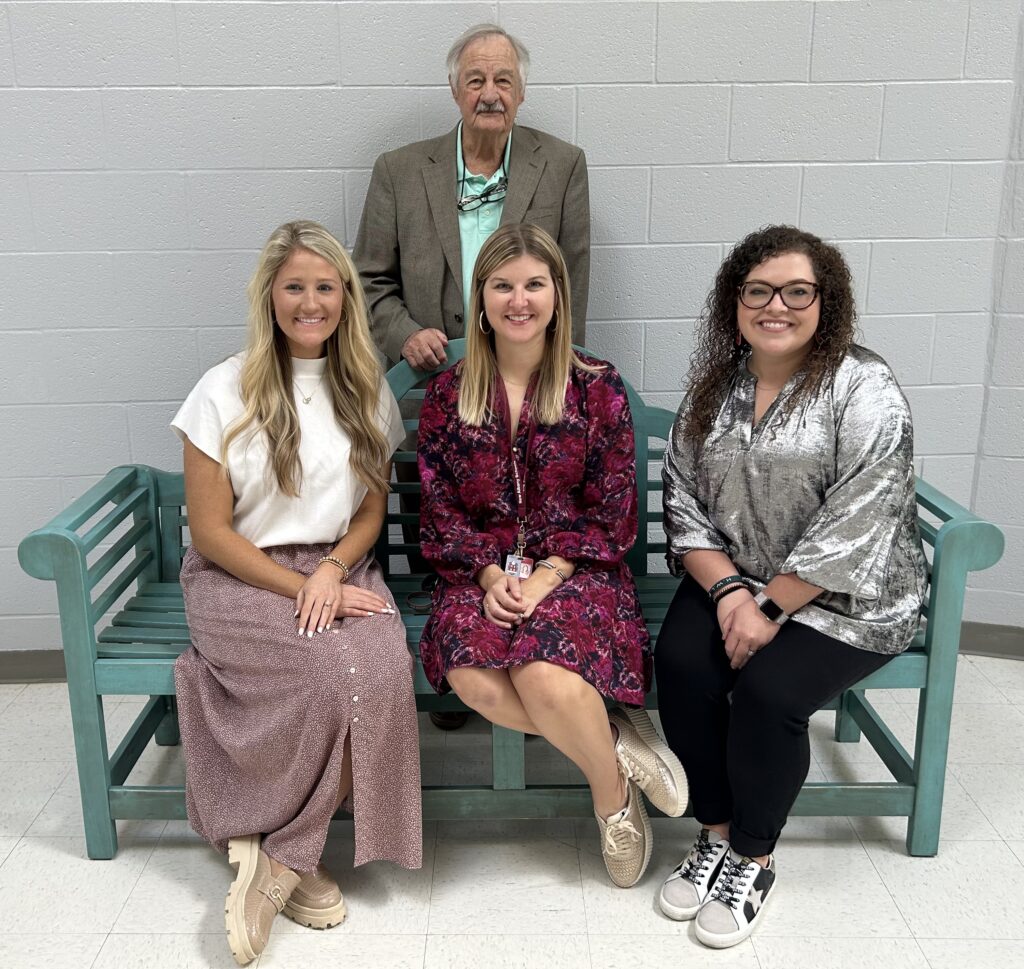 Pictured front row l-r: Laura Buskirk, Brittany Brock, Kacie Sewell; back row: Dr. Bob Ferguson. 