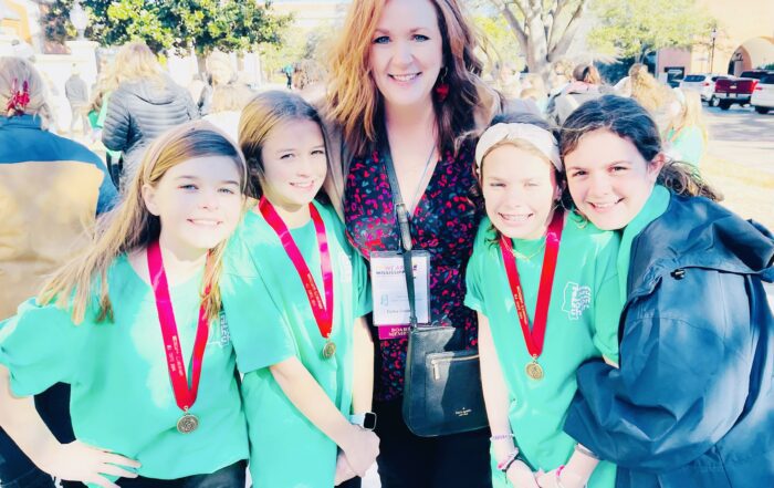 New Albany Elementary School students Ivery Spencer, Doro Smith, Abbi Buchanan, and Grace Garrett participated in the All State Elementary Honor Choir. The choir consisted of 142 students from across the state. It was held January 18-20 at the University of Southern Mississippi. Pictured with the students is Celia Criddle, NAES Music Teacher.