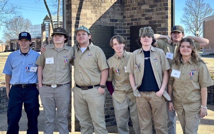 The following students from the New Albany School of Career & Technical Education placed in the SkillsUSA Regional Competition at Mississippi Delta Community College on February 6 (l-r): Reed Taylor - Silver in Auto Service; Jax Gannon - Gold in Electric; Jamison Miller - Gold in Cabinet Making; and Jamison Garvey, Gage Harrell, John Davis and Isabelle Grose - Silver in Teamworks. All of these students will advance to the SkillsUSA State Competition. Rick Robbins, Jonathan Garrison and Kevin Wigington are the SkillsUSA advisors.